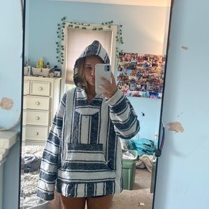rug beach sweater